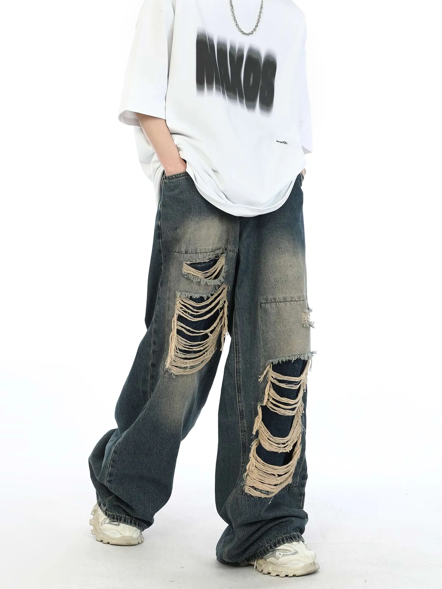 Distressed Patchwork Jeans