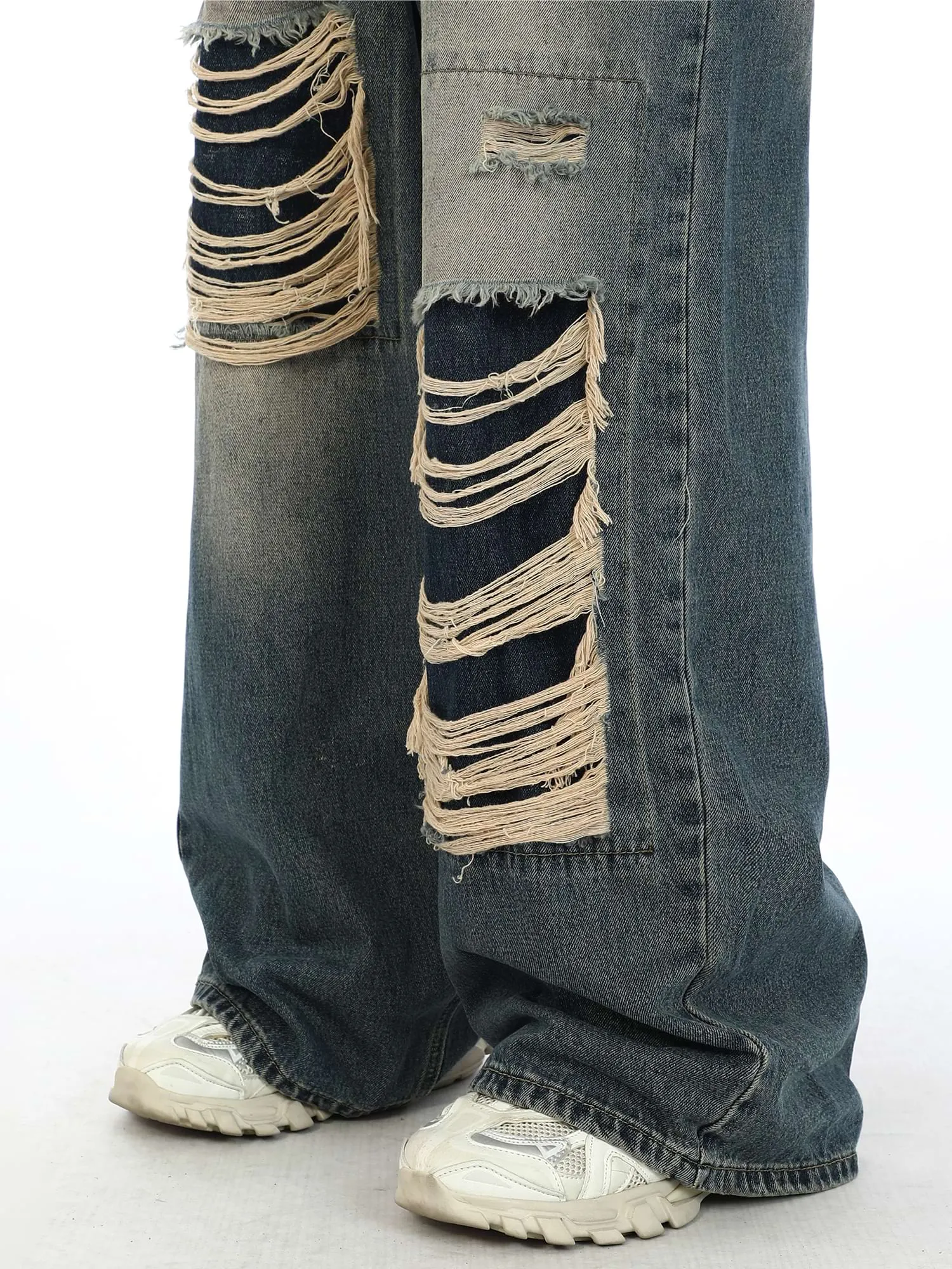 Distressed Patchwork Jeans